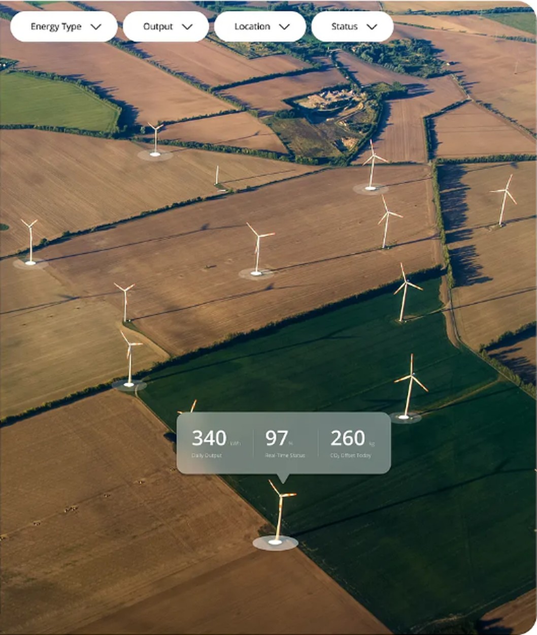 Aerial farmland with wind turbines